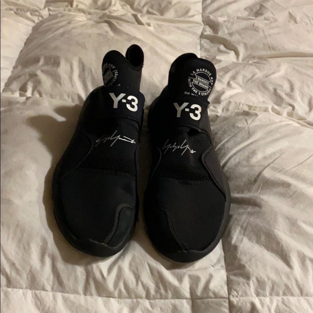 Pair of all black neoprene shoes